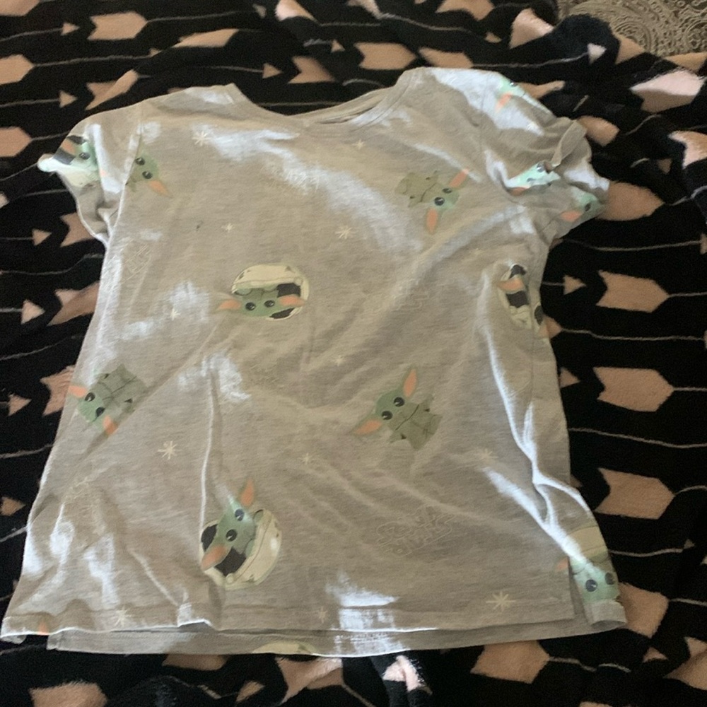 A baby Yoda Star Wars shirt
